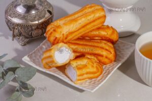 Пирожные заварные Эклер со сливками со вкусом клубники